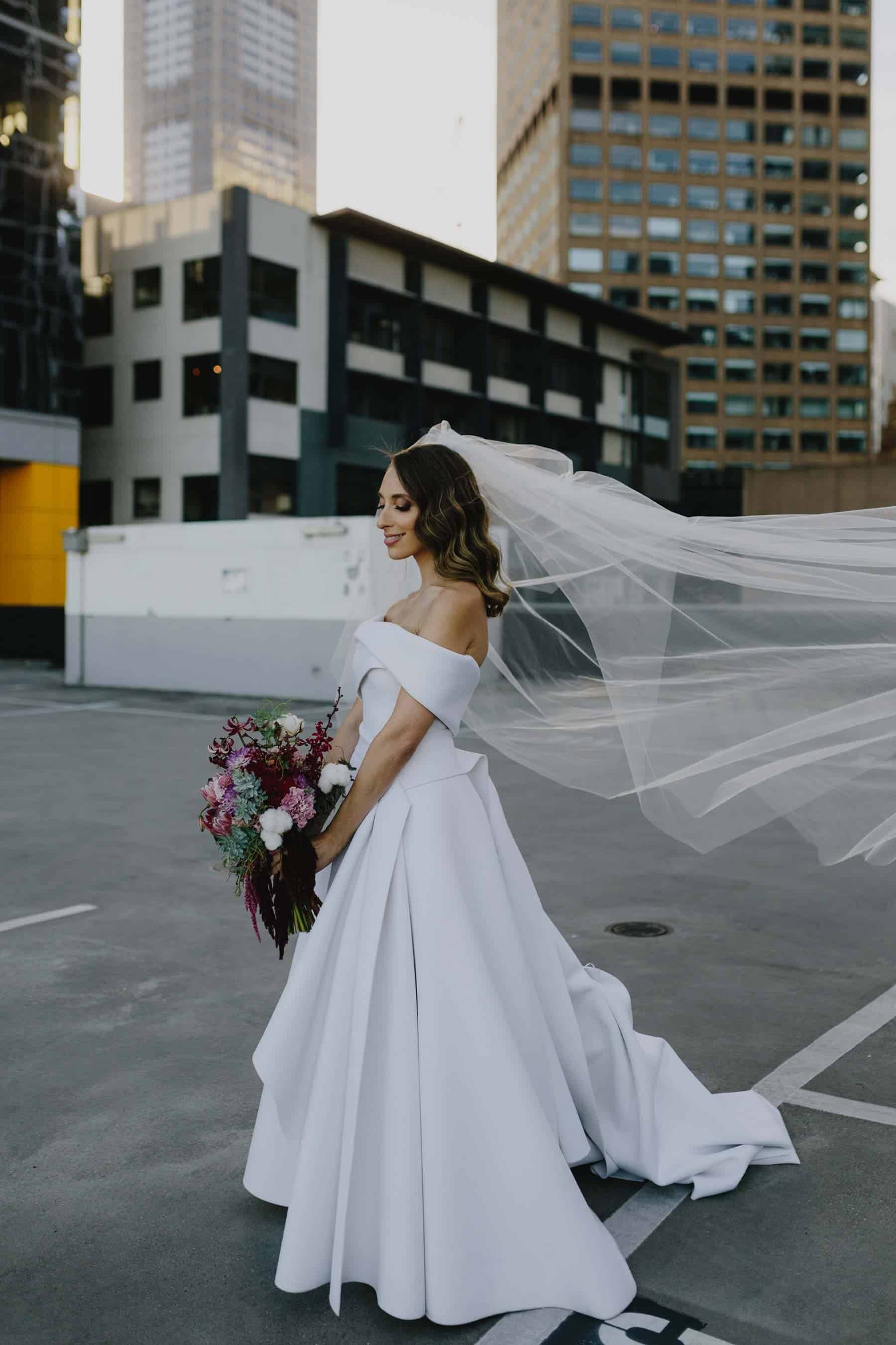 modern off-shouder wedding dress by Cappellazzo Couture