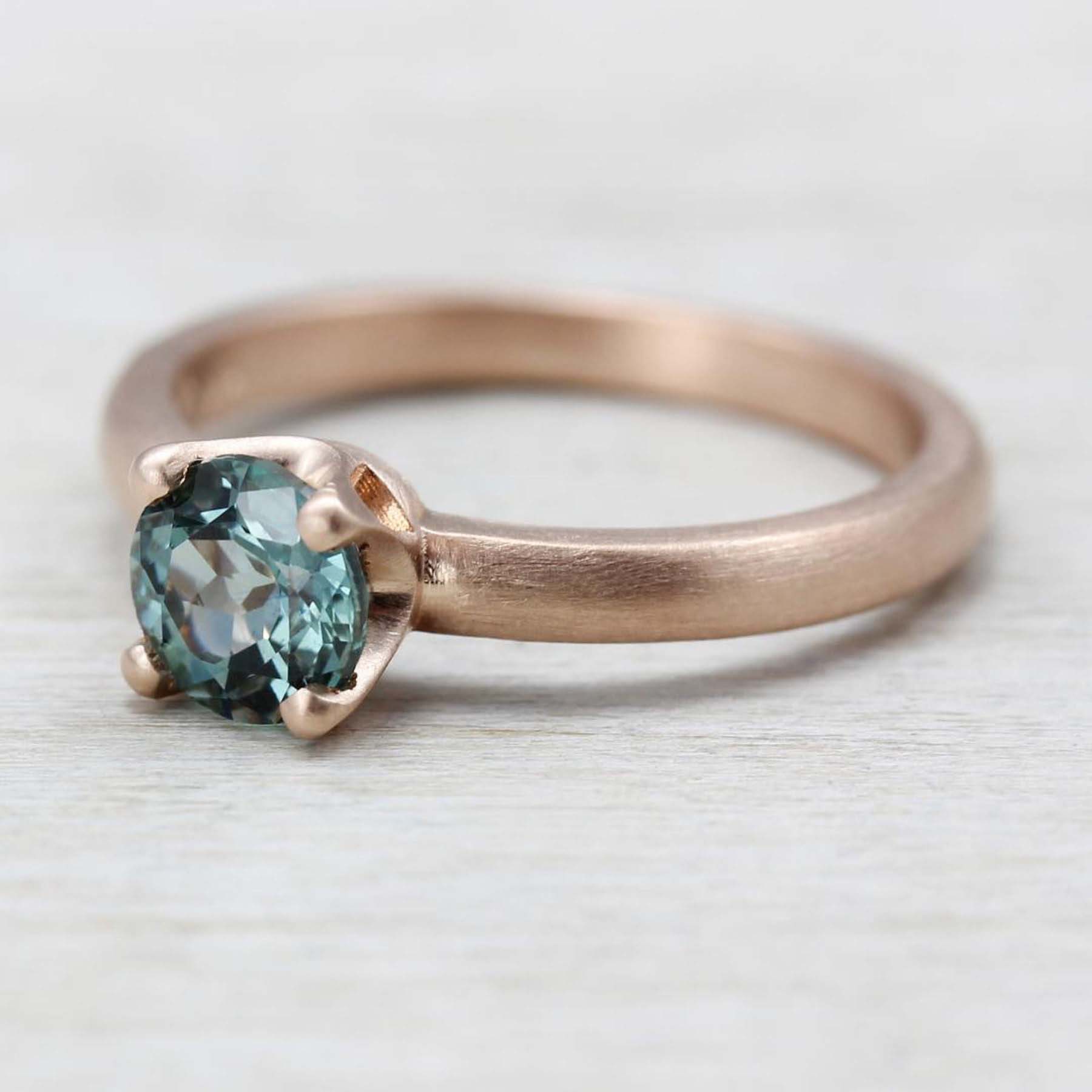 rose gold engagement ring with aqua blue fair trade Malawi sapphire by Aide-memoire