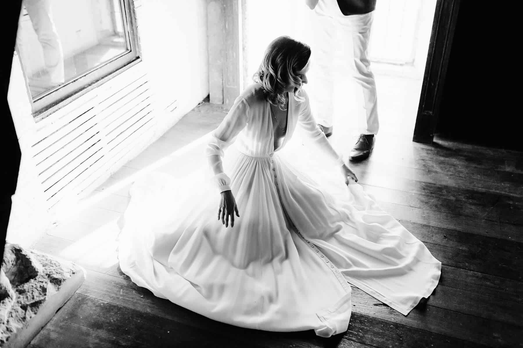 long sleeve wedding dress with plunging neckline by Houghton NYC