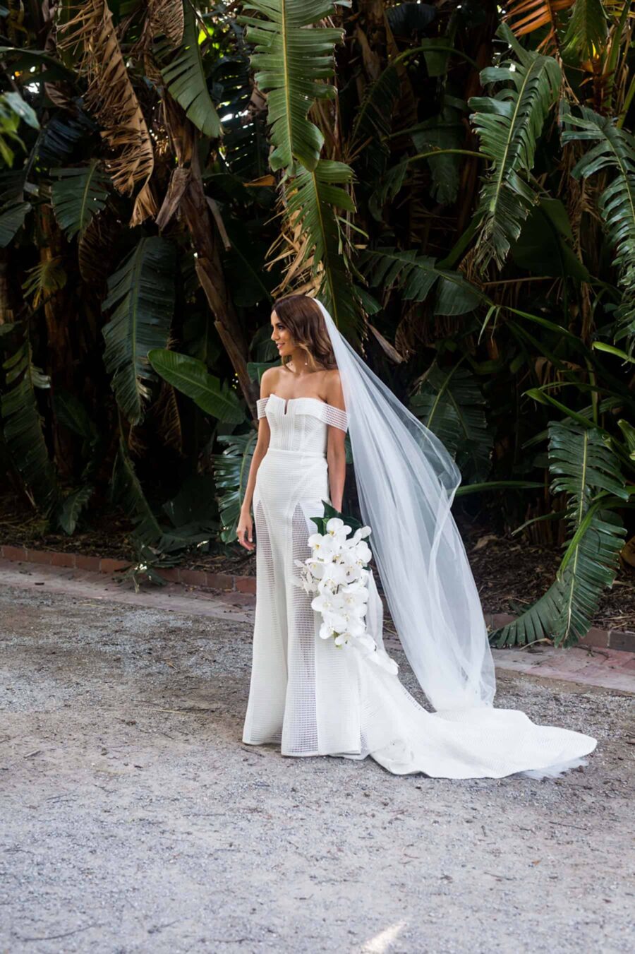 modern bride in off-shoulder wedding dress by Georgia young Couture
