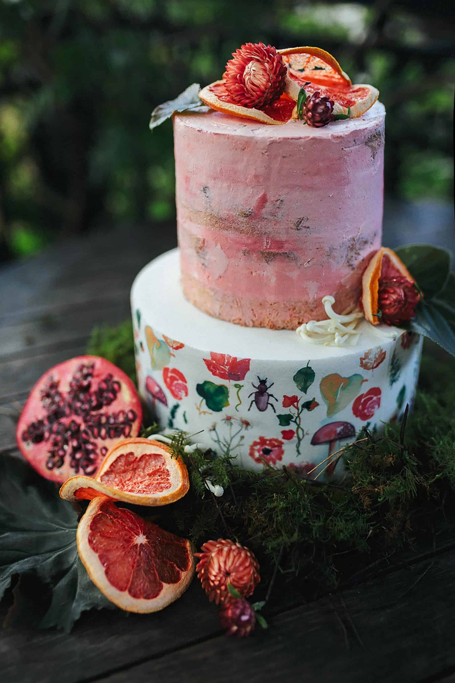 pink wedding cake with watercolour botanic illustrations