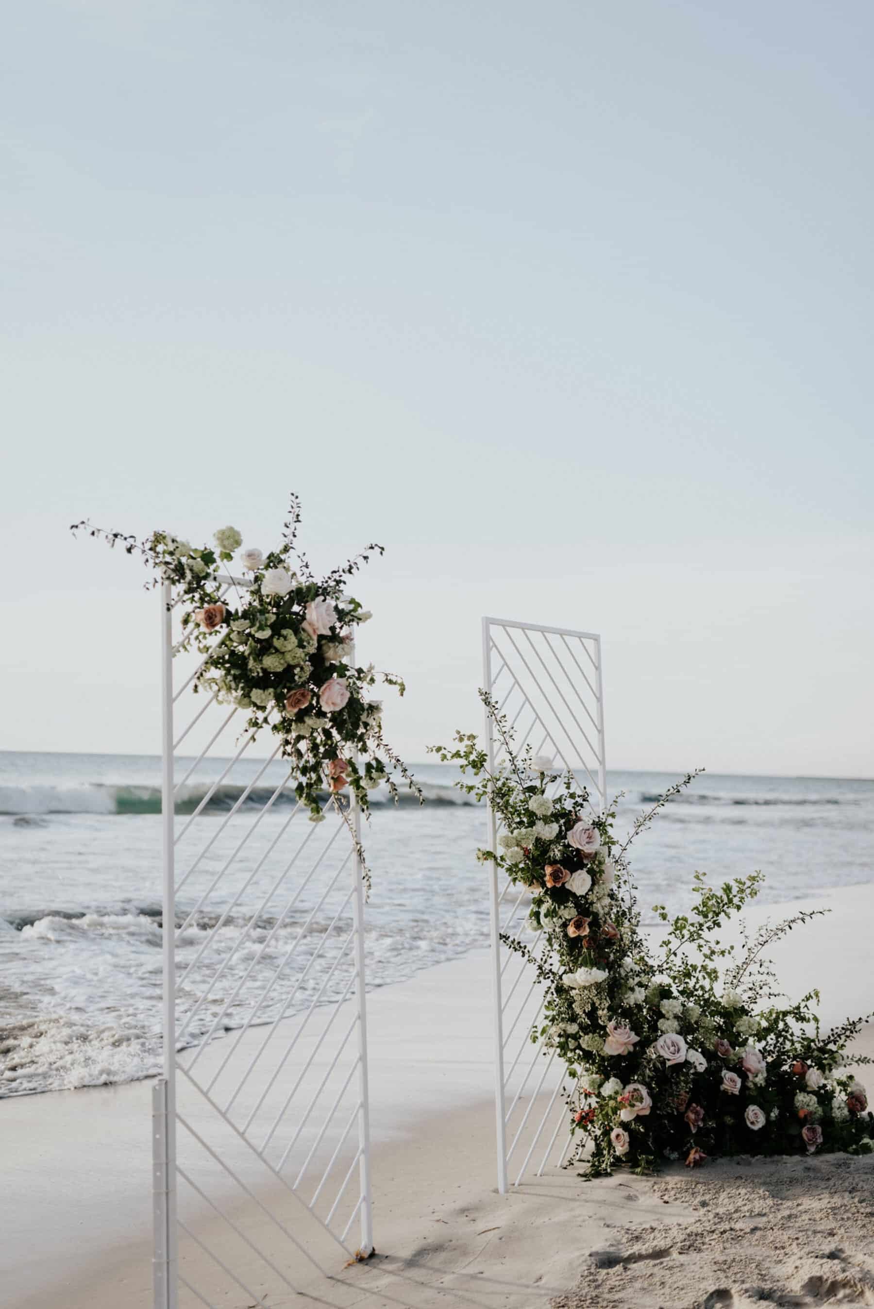 Best of 2018: wedding flowers. beach wedding with floral backdrop