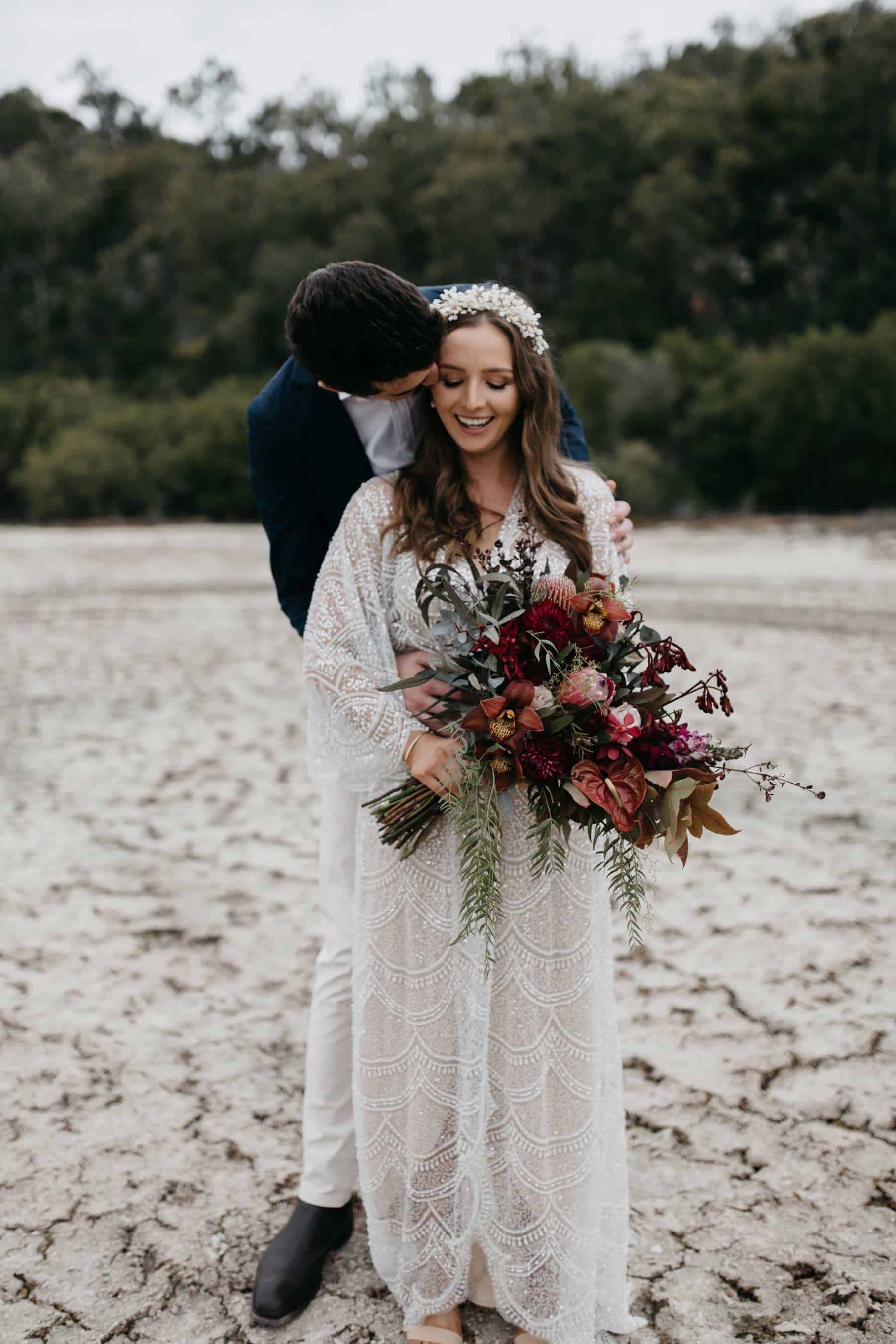 boho bride in sequin wedding dress and bridal hairpiece