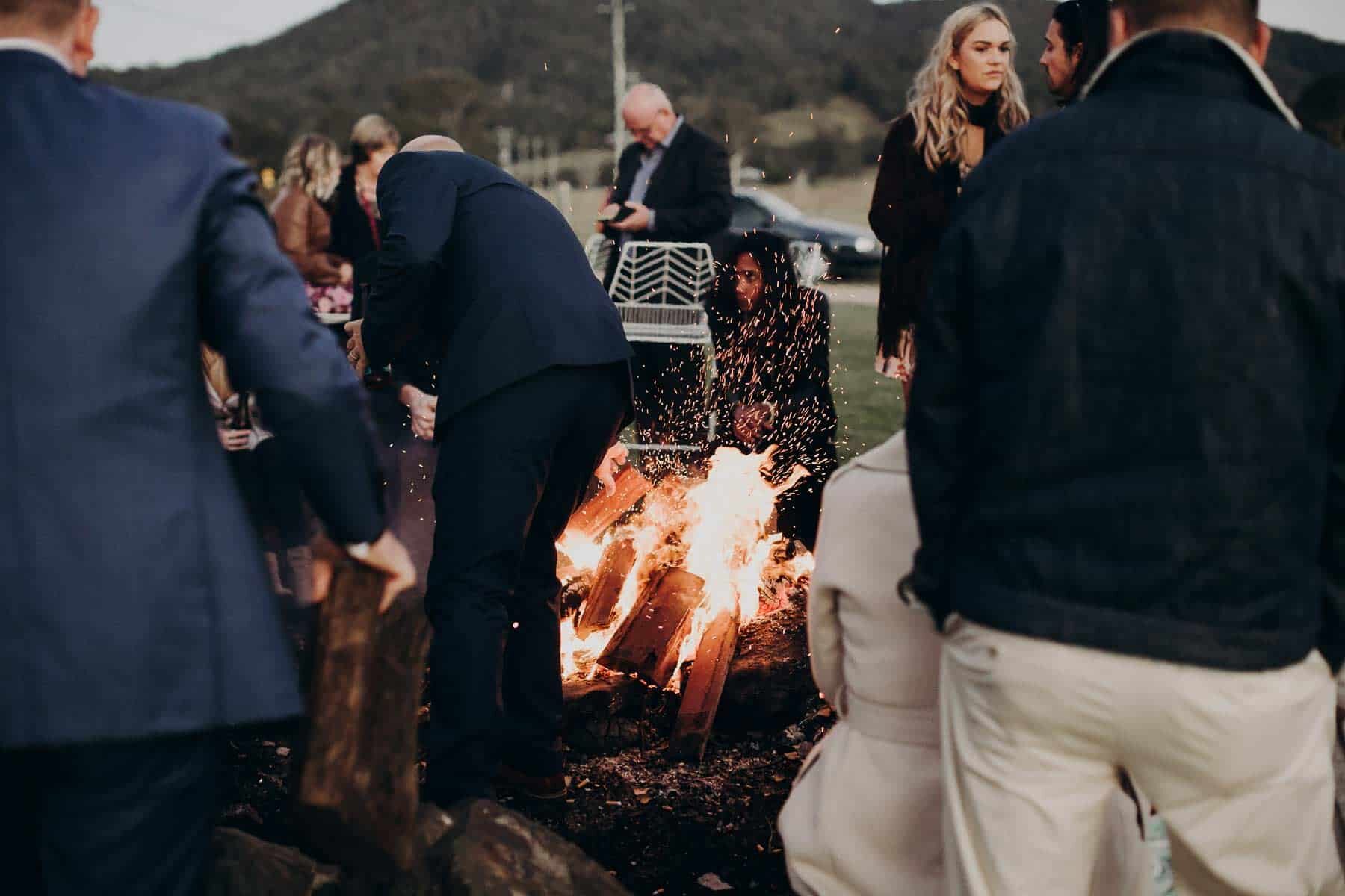 rutic outdoor wedding with bonfire
