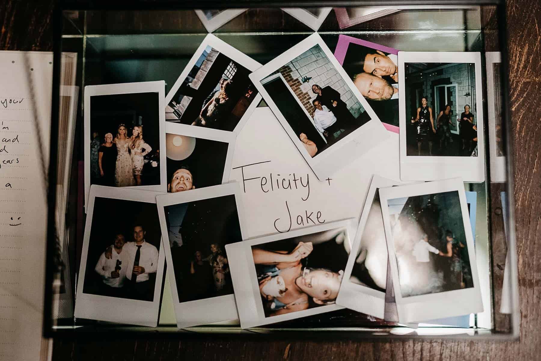 Polaroids in table for wedding reception