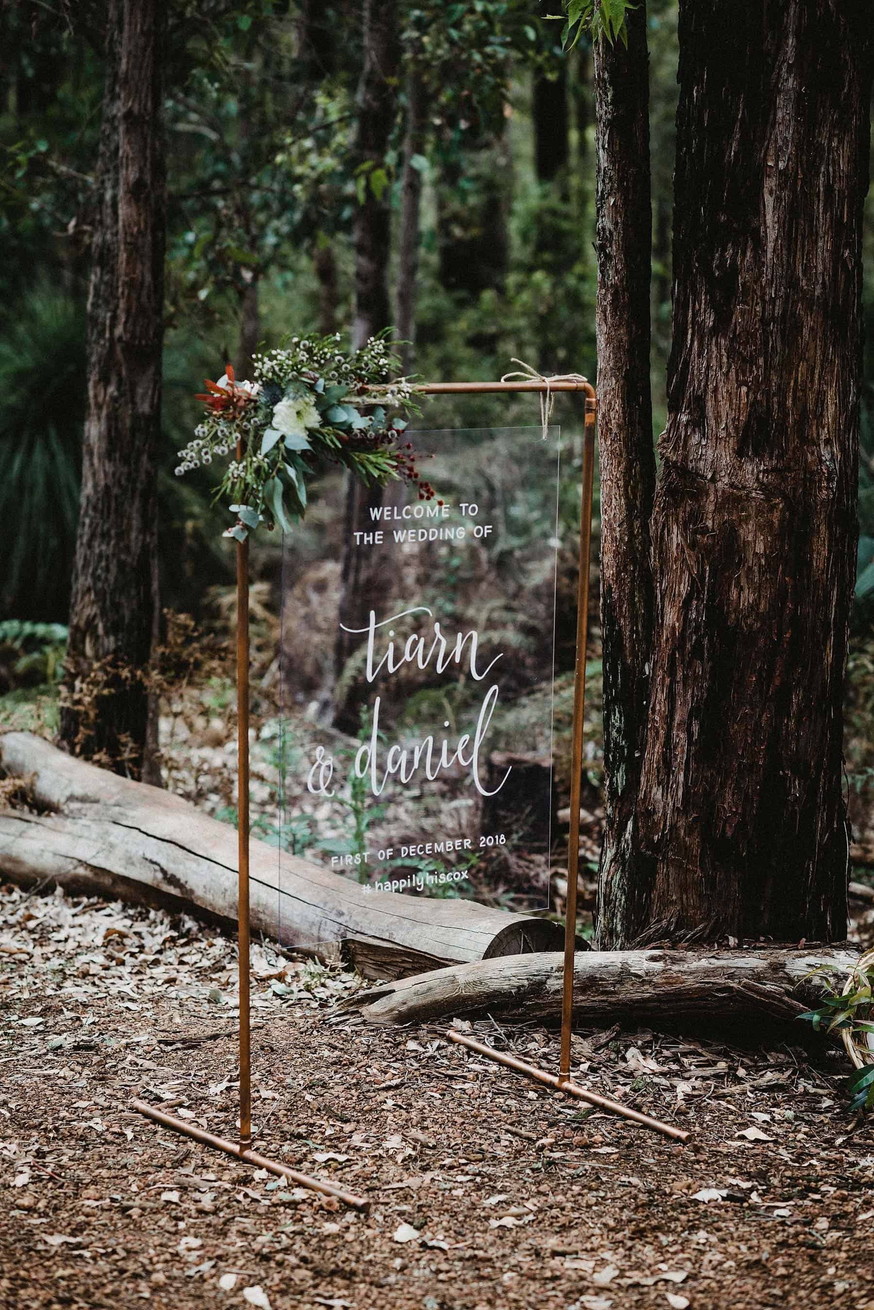 Rustic forest wedding welcome sign