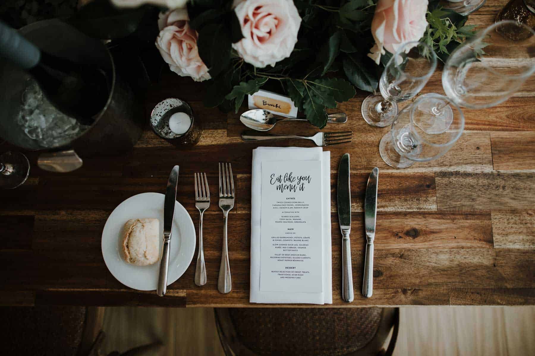 modern table setting on exposed wood