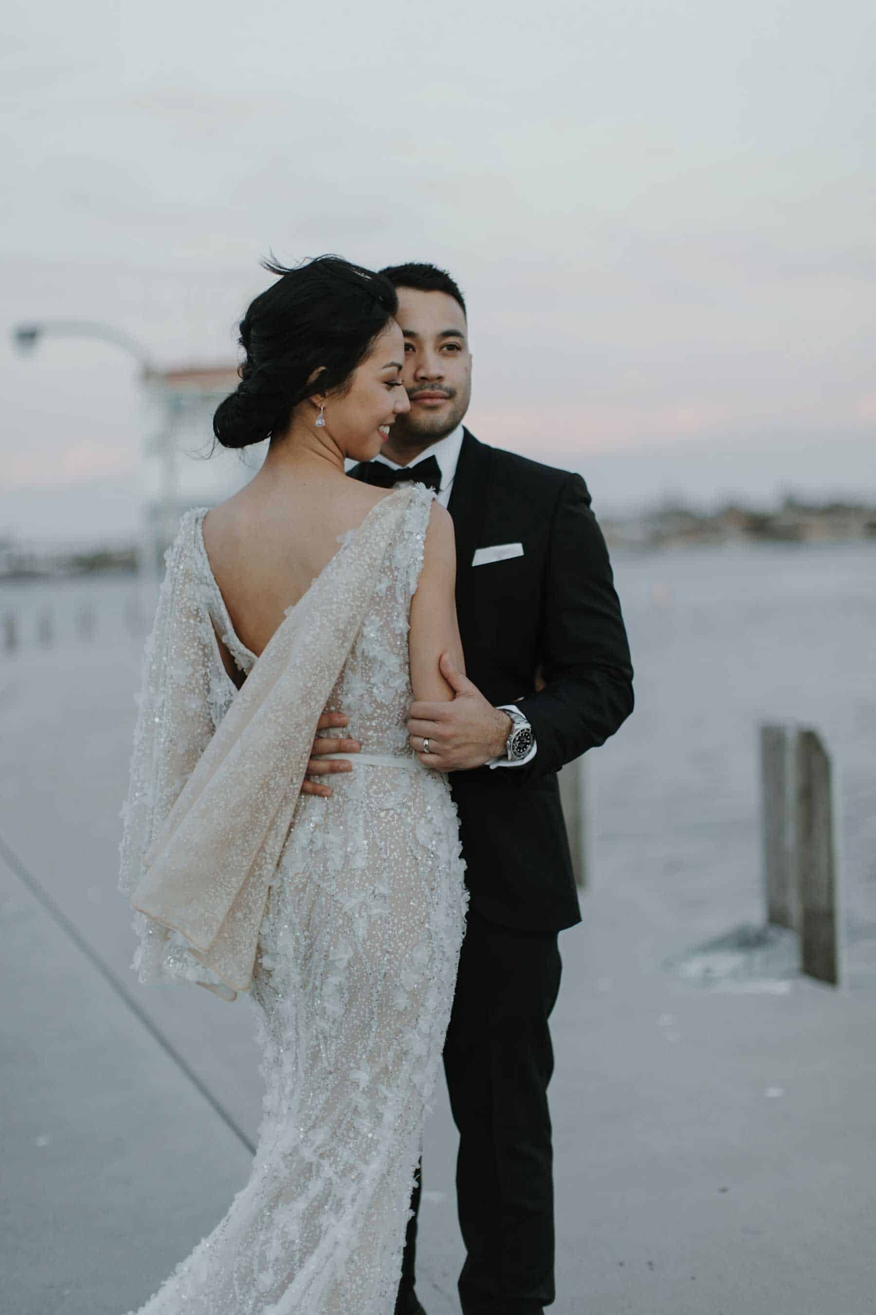 embellished bridal gown with cape detail