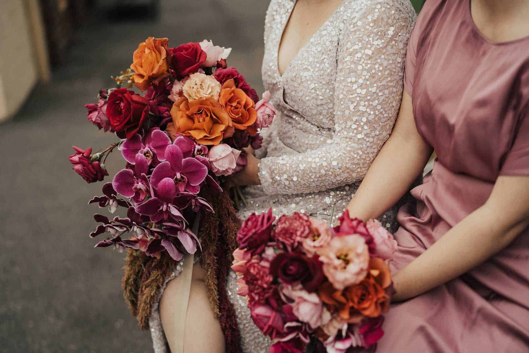 modern bridal bouquet with pink and orange flowers