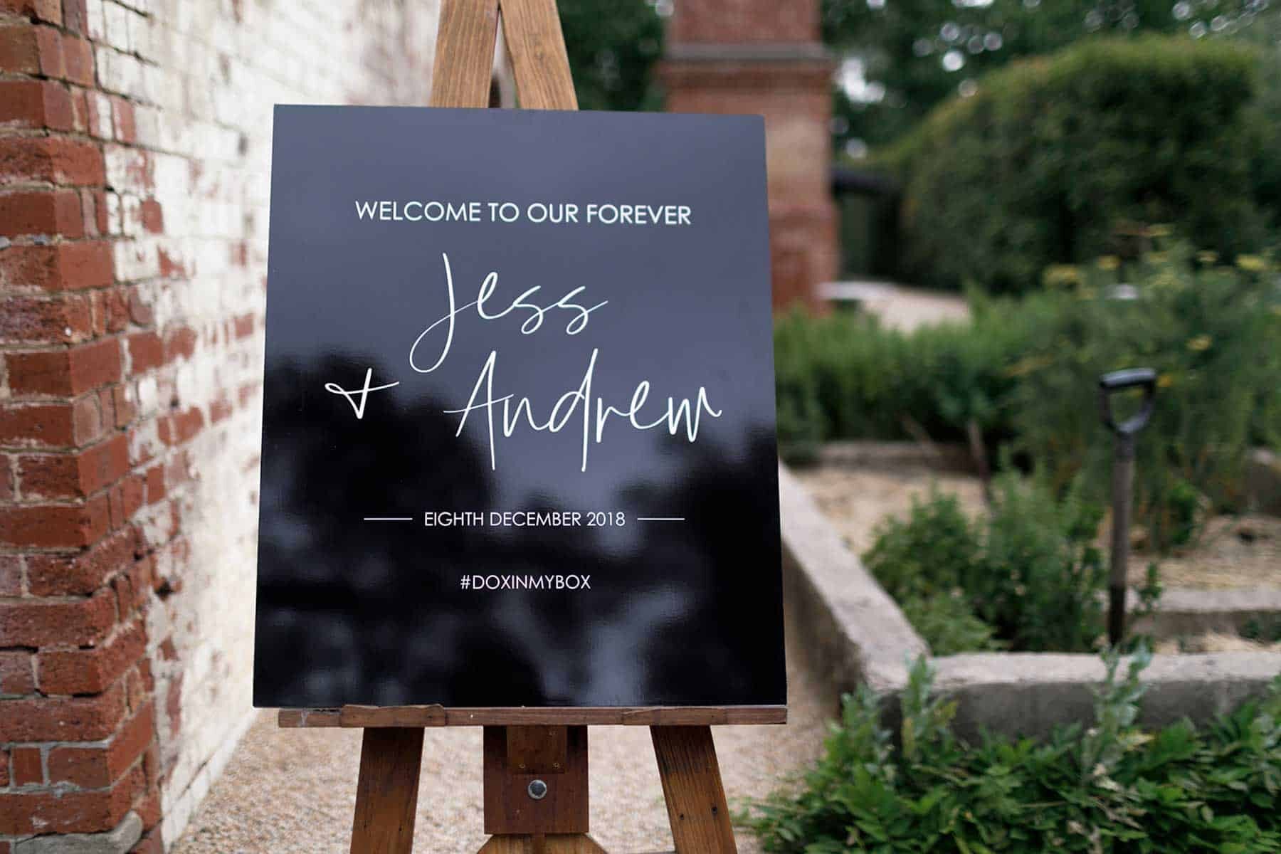 black acrylic wedding signage