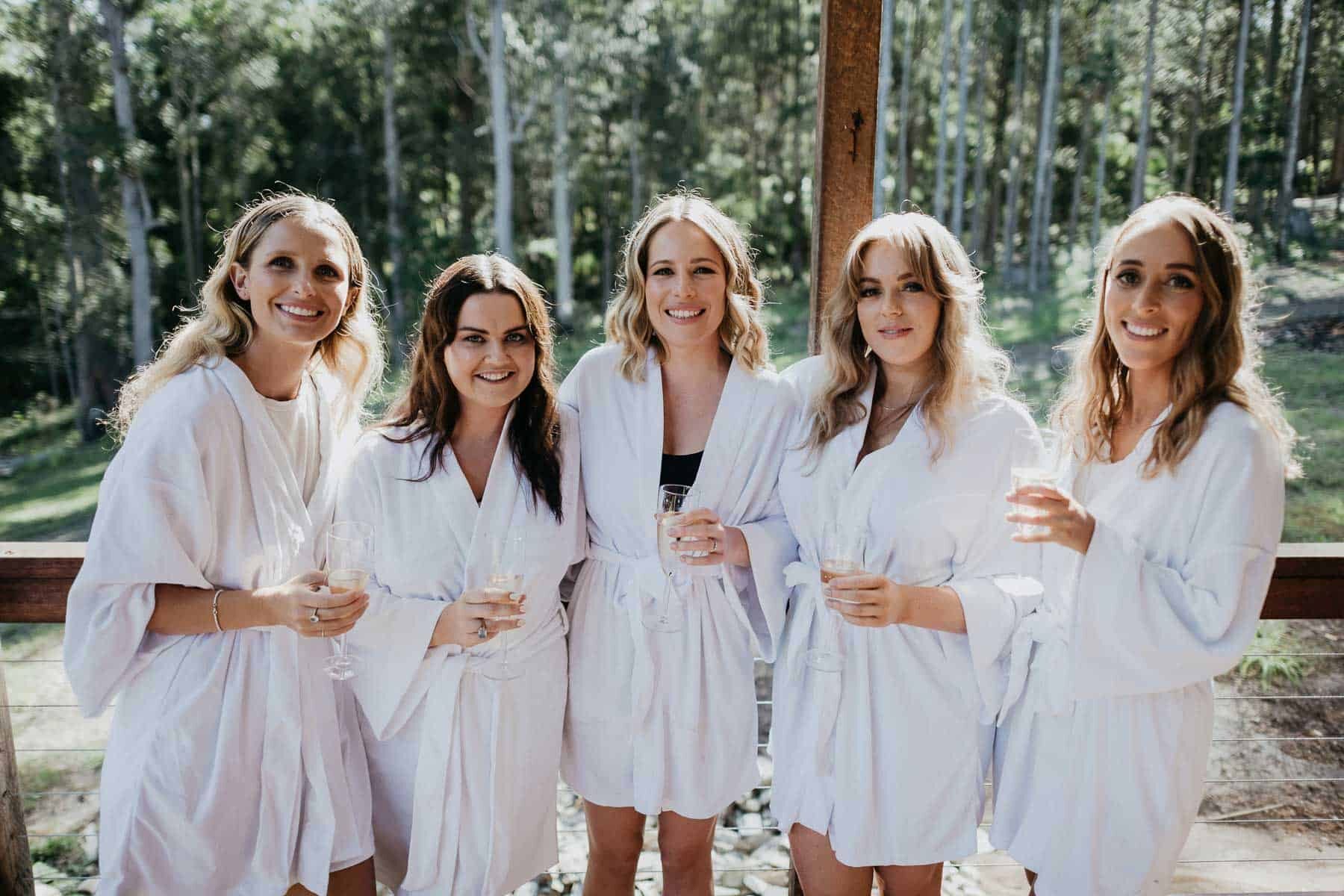 white bridesmaids robes
