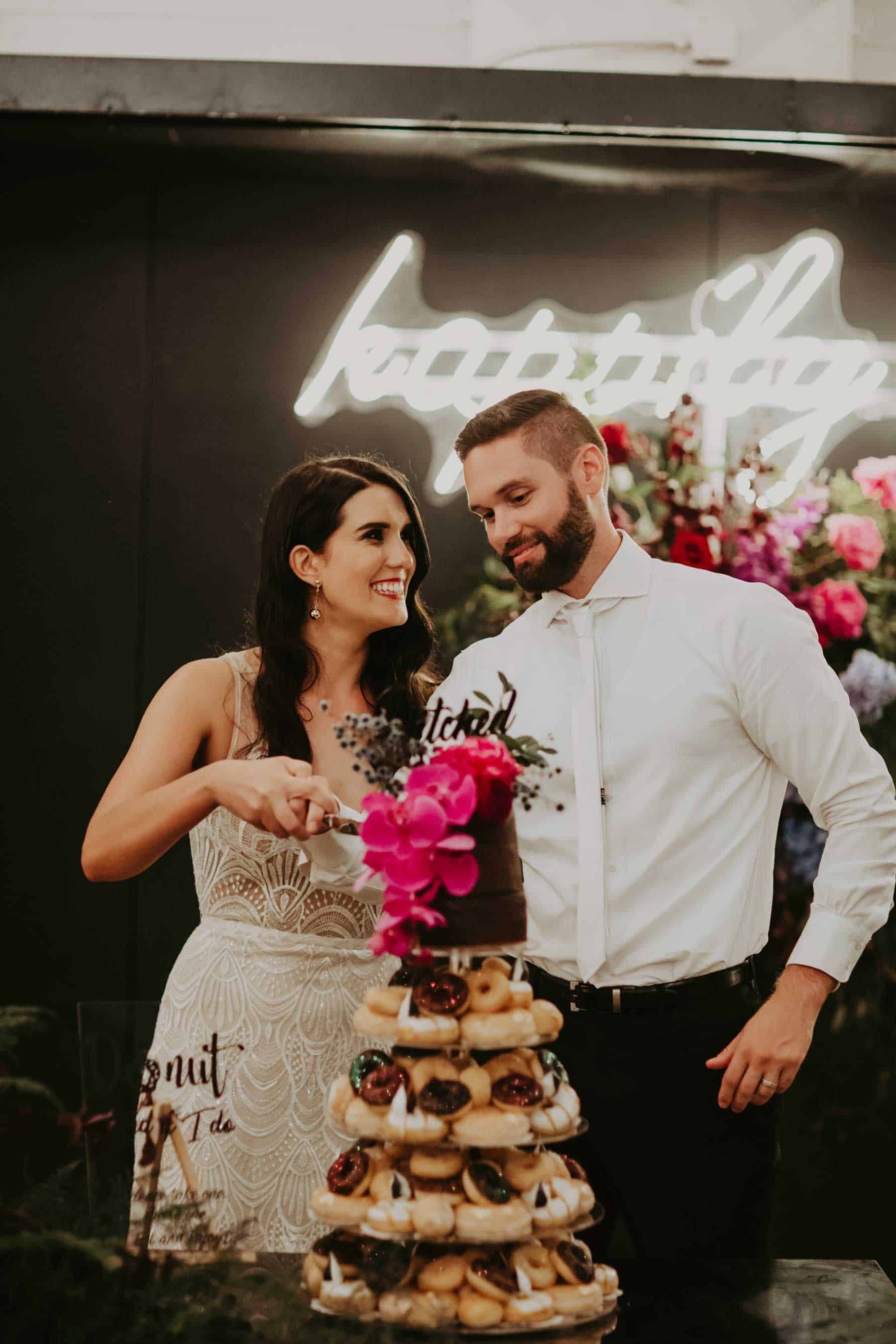 donut wedding cake with top tier cake
