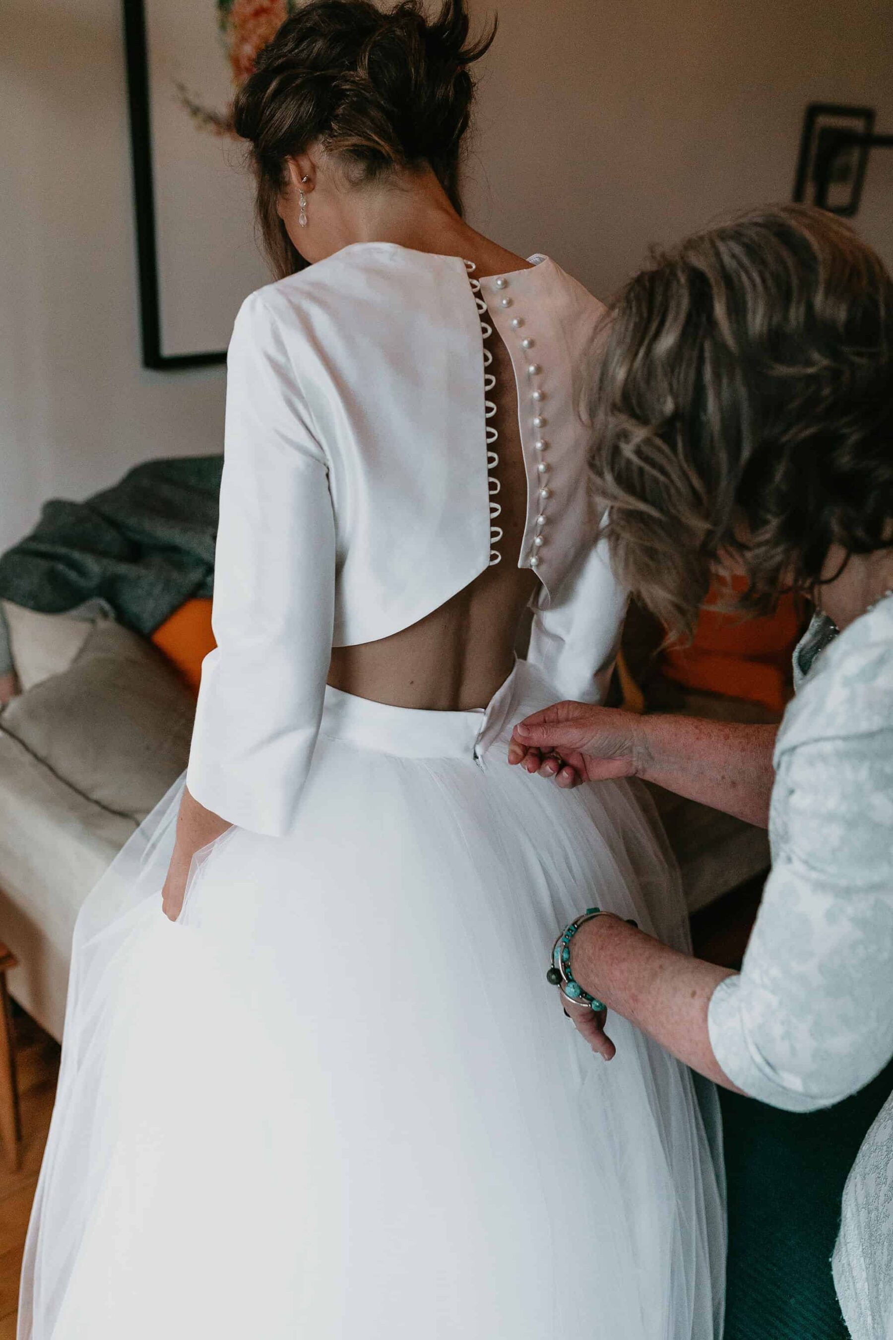 long sleeve two-piece wedding dress with tulle skirt and crop top