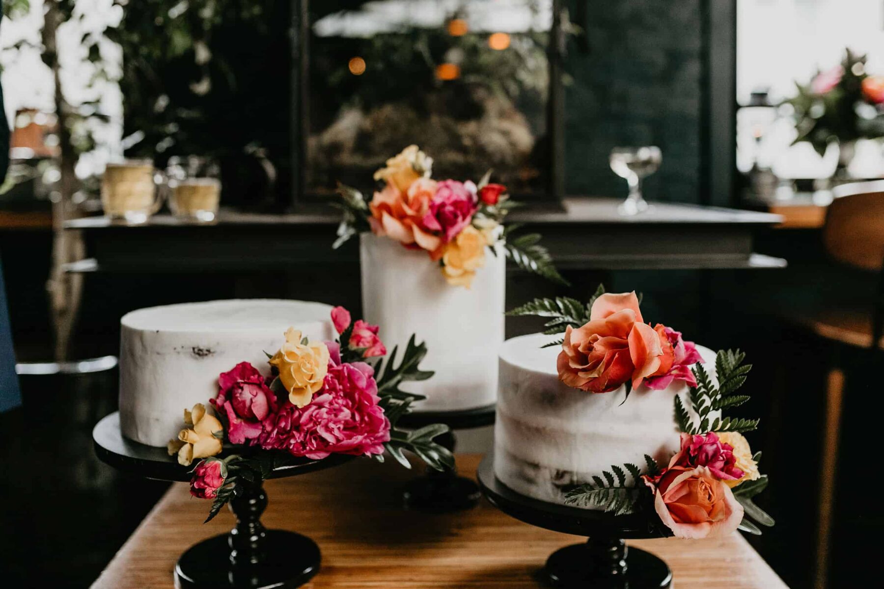 simple modern wedding cake with fresh flowers