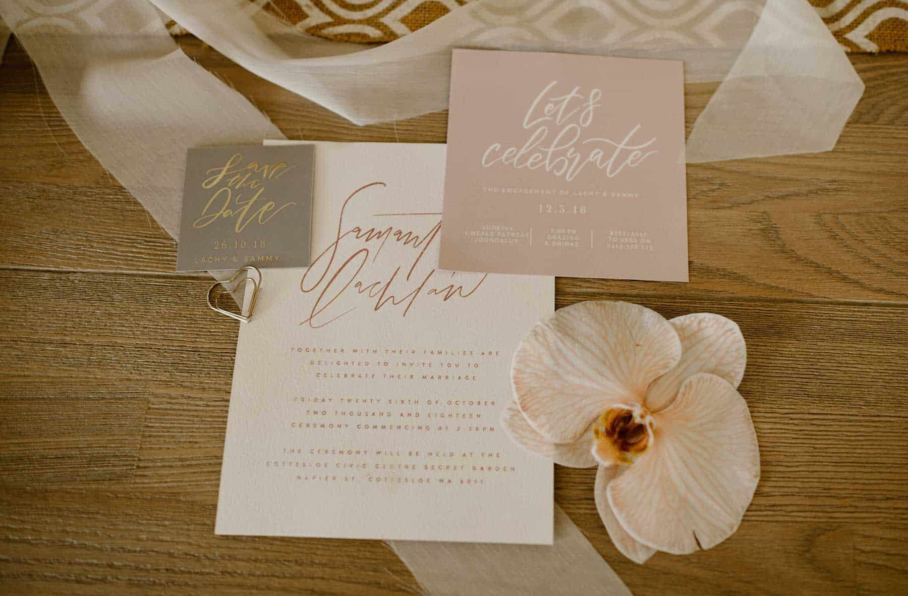 blush and sage typographic wedding invitations