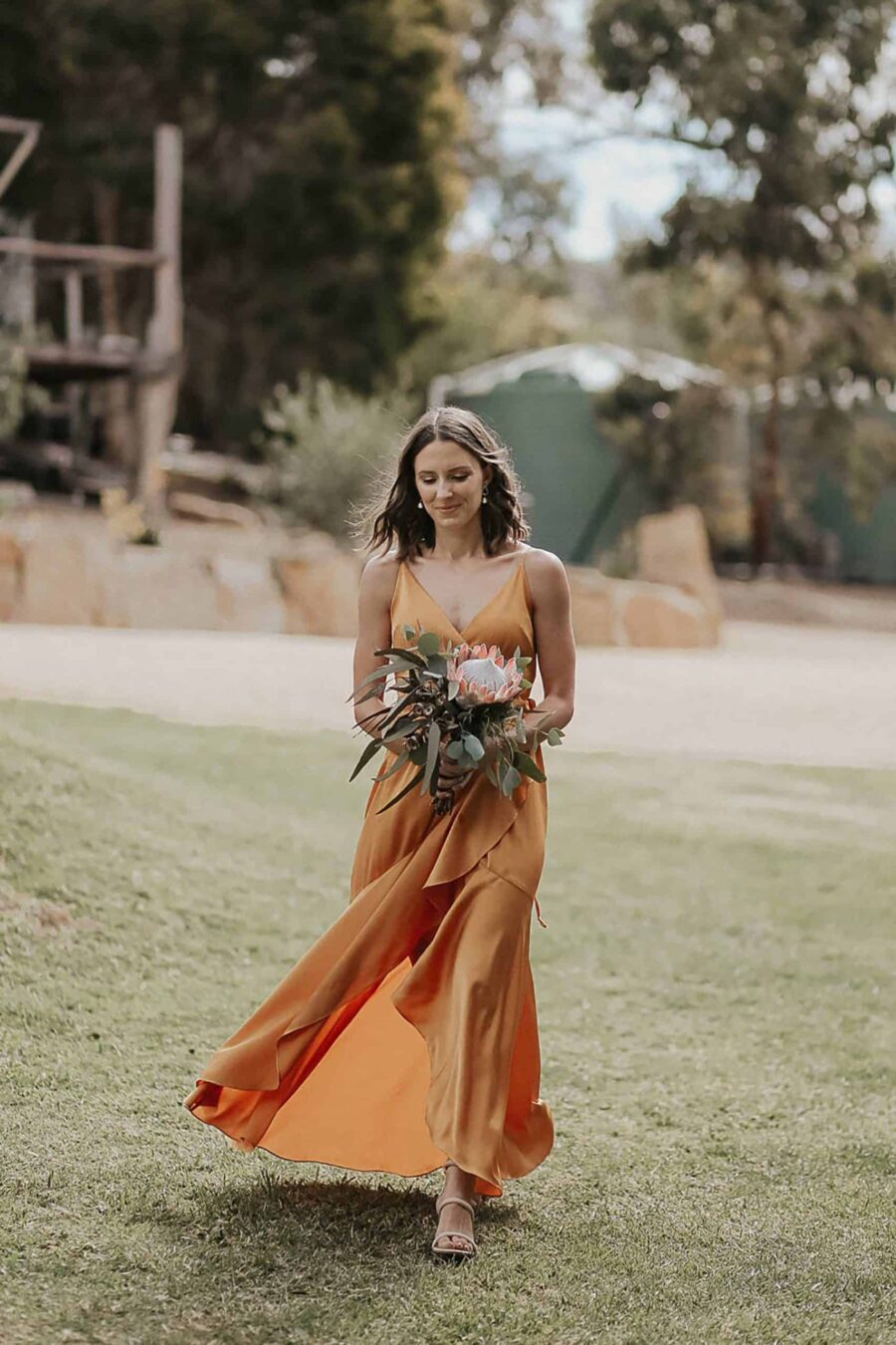 bridesmaid in gold dress