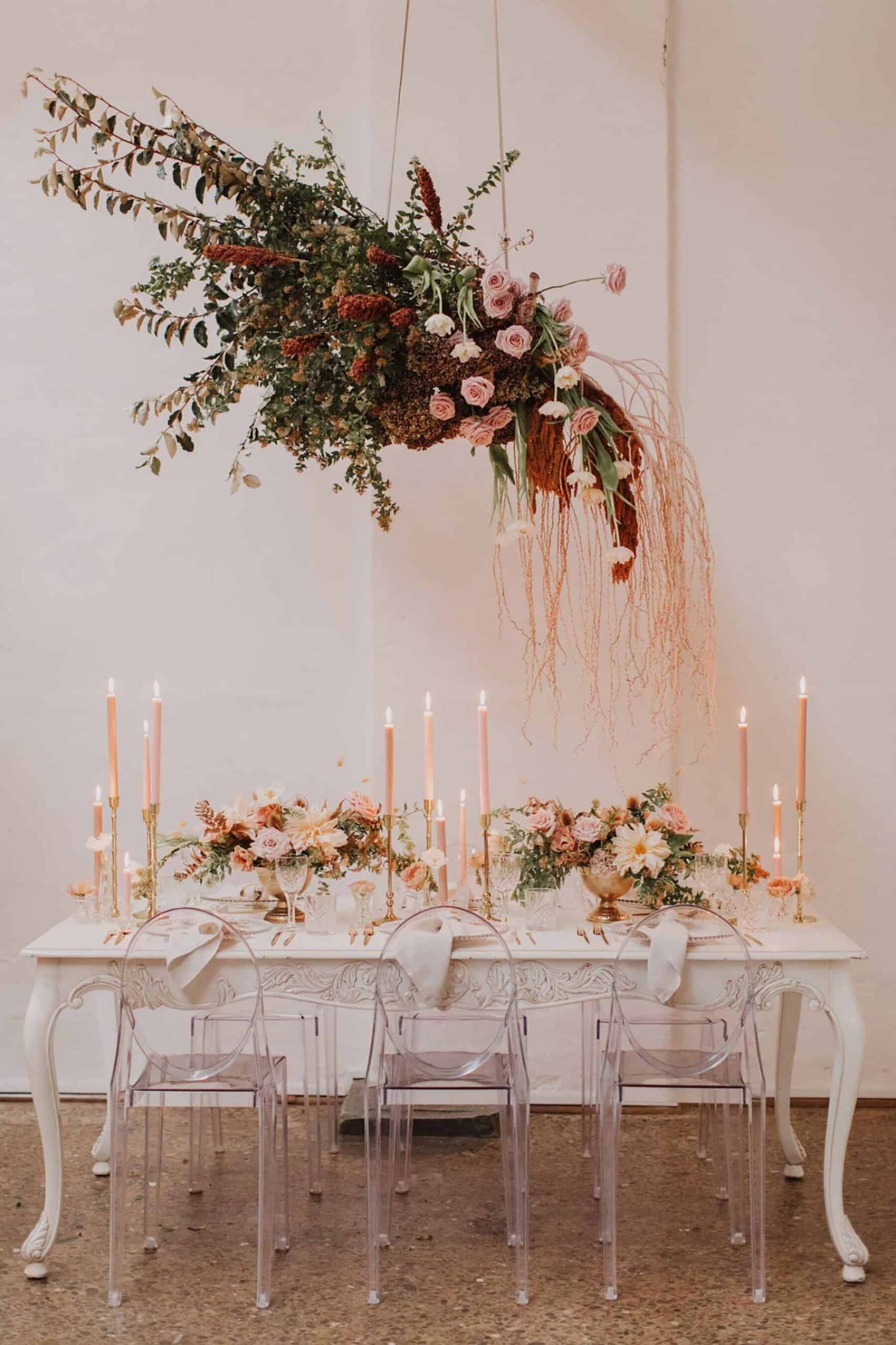 romantic table setting with floral chandelier