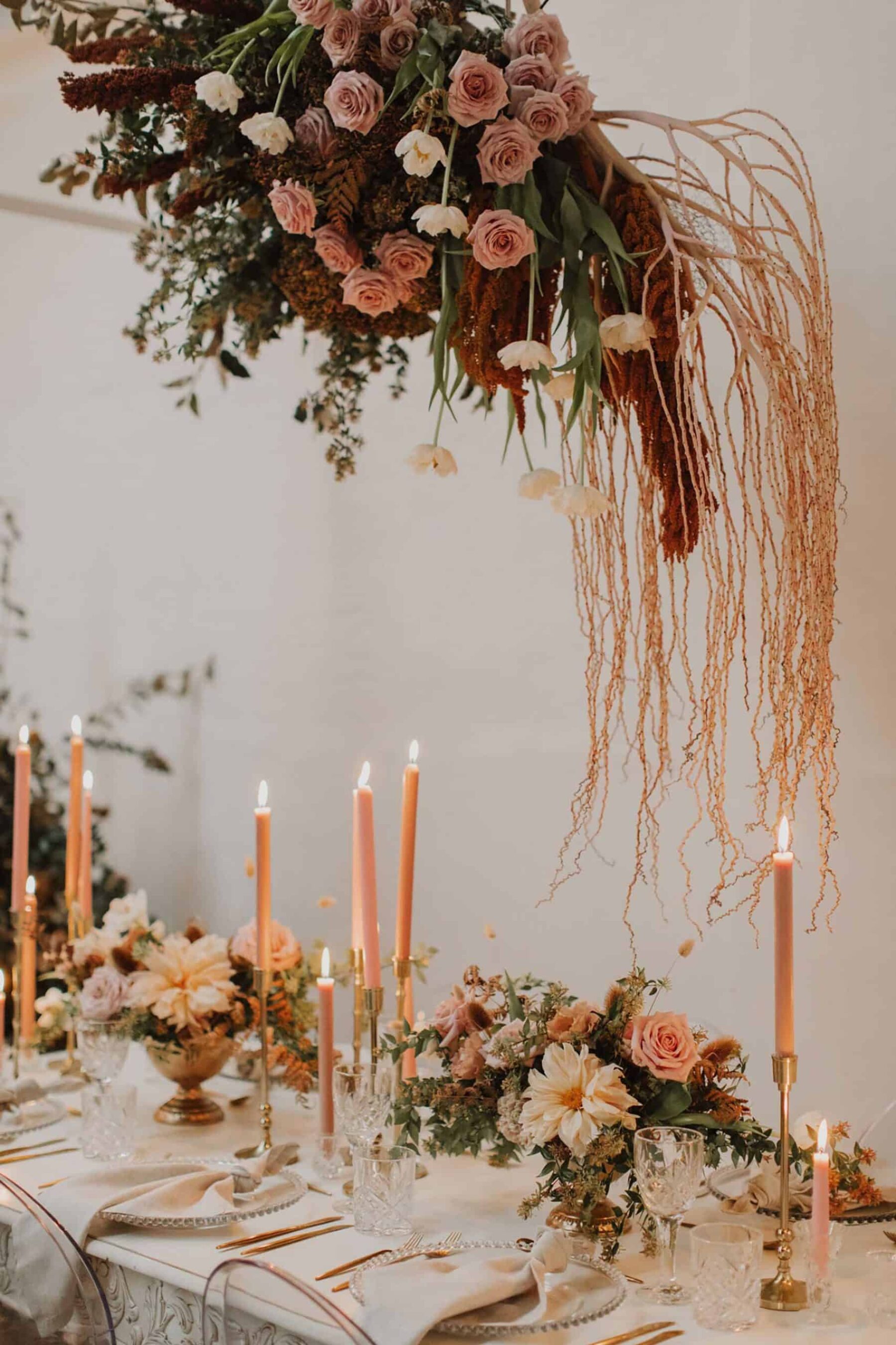 romantic table setting with floral chandelier