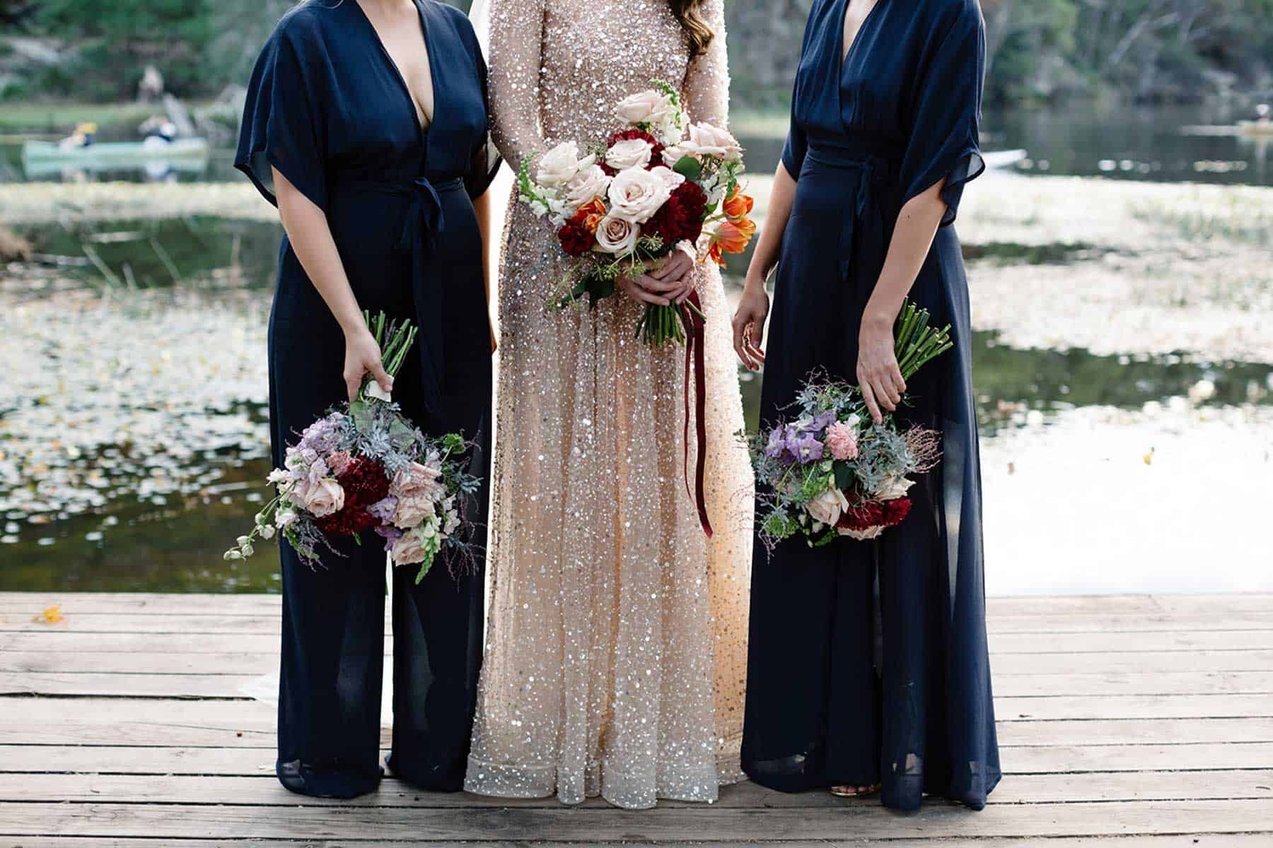 long navy bridesmaid dress and jumpsuit from Reformation