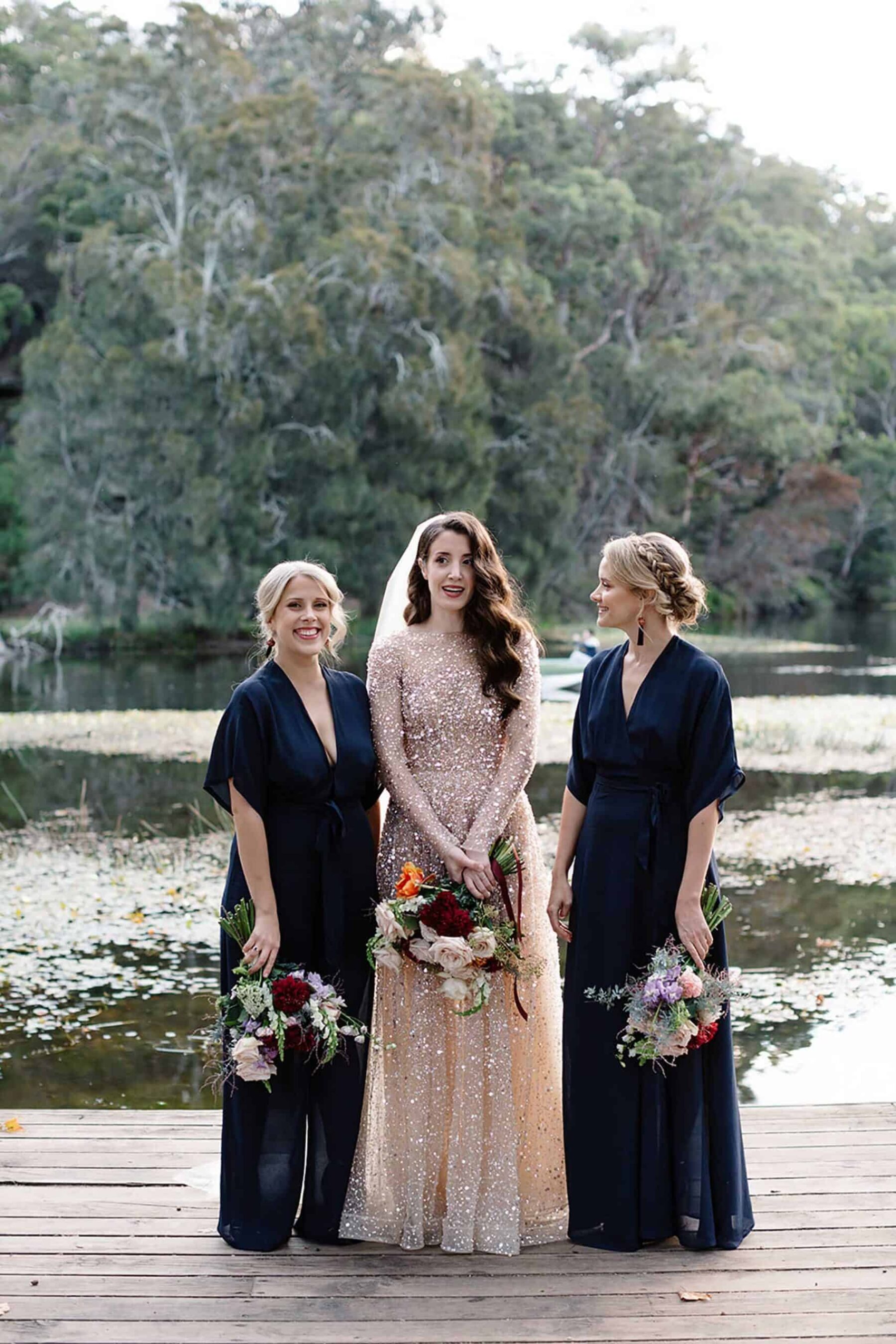long navy bridesmaid dress and jumpsuit from Reformation