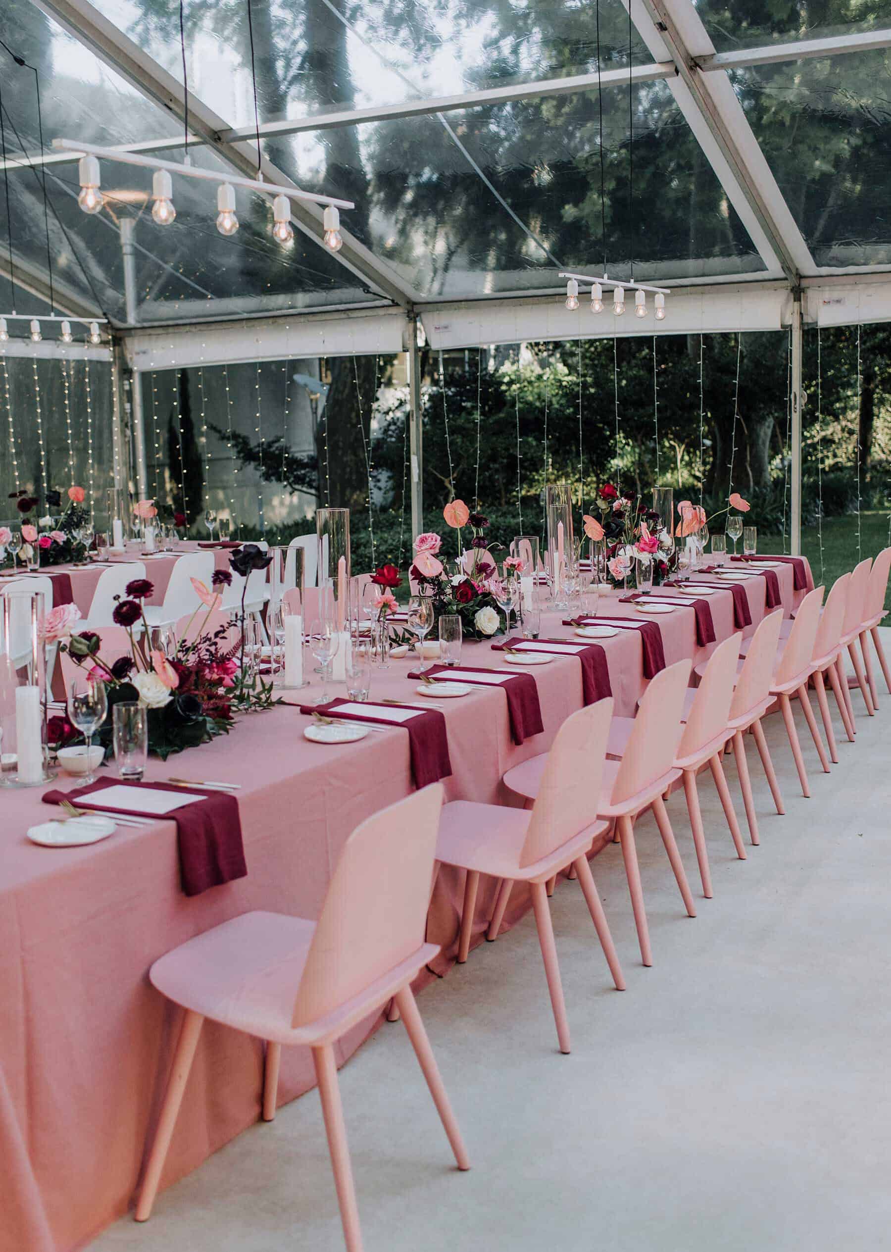 pink bridal table with pink chairs