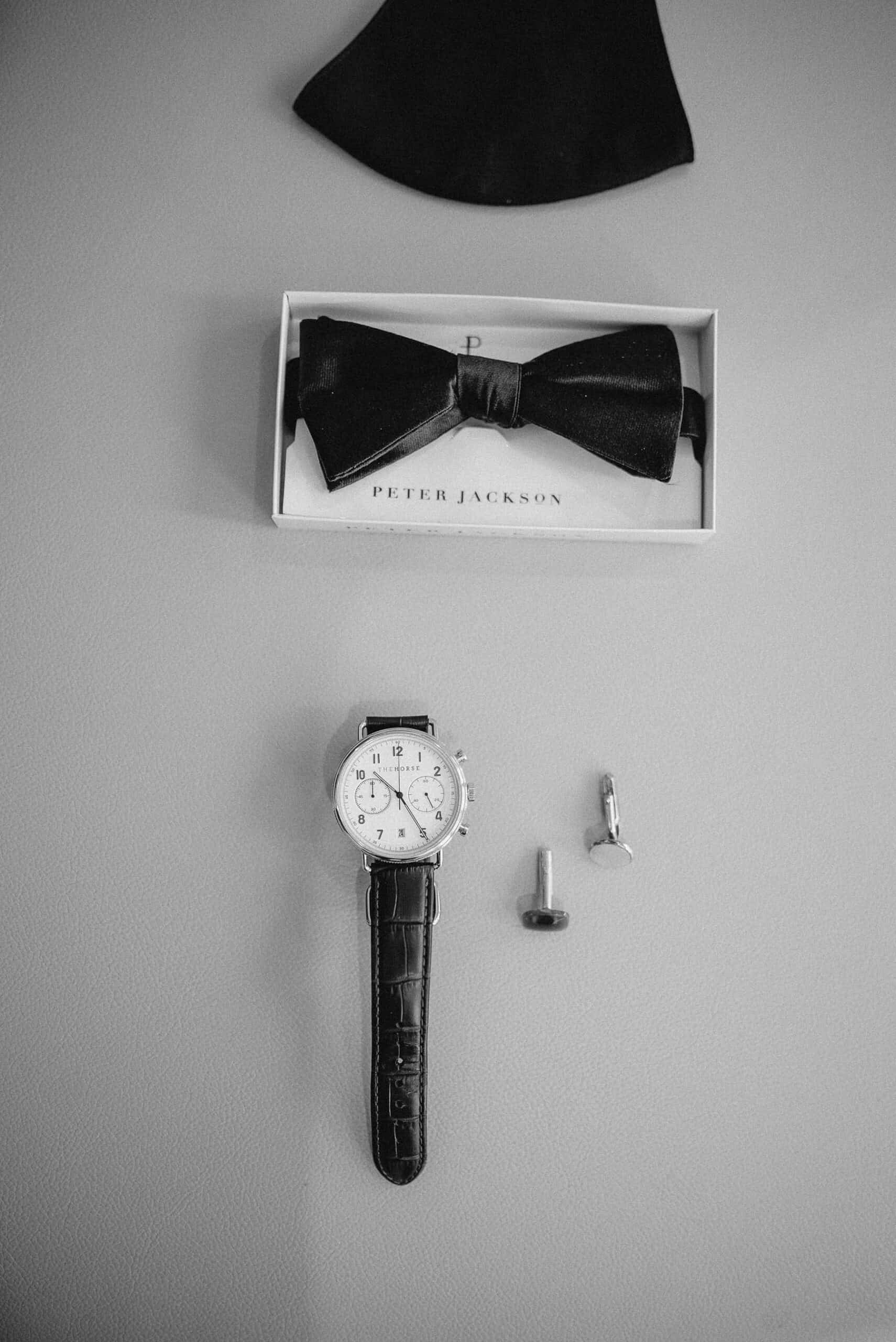Black bow tie and watch